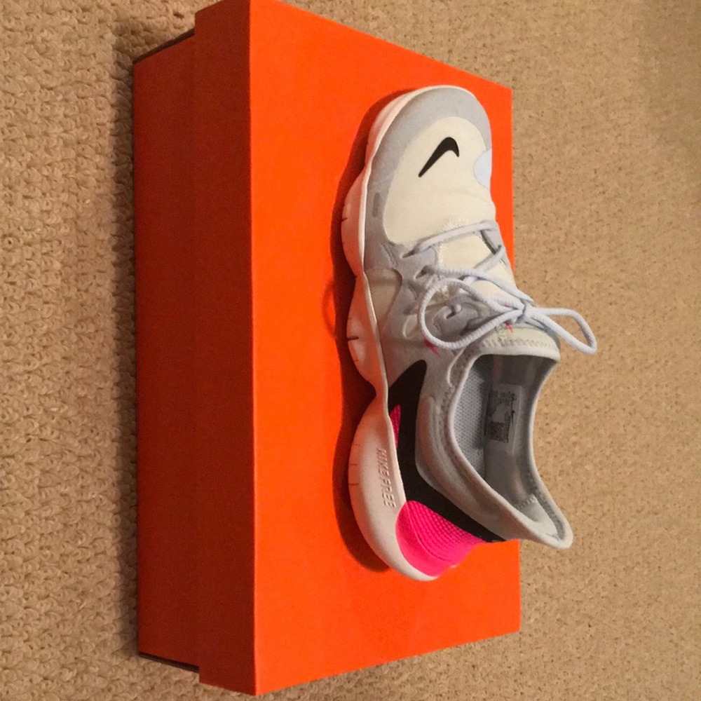 Women’s Nike RN Athletic shoes. Worn 1 time. Smoke and pet free home. 7.5 Cool!
